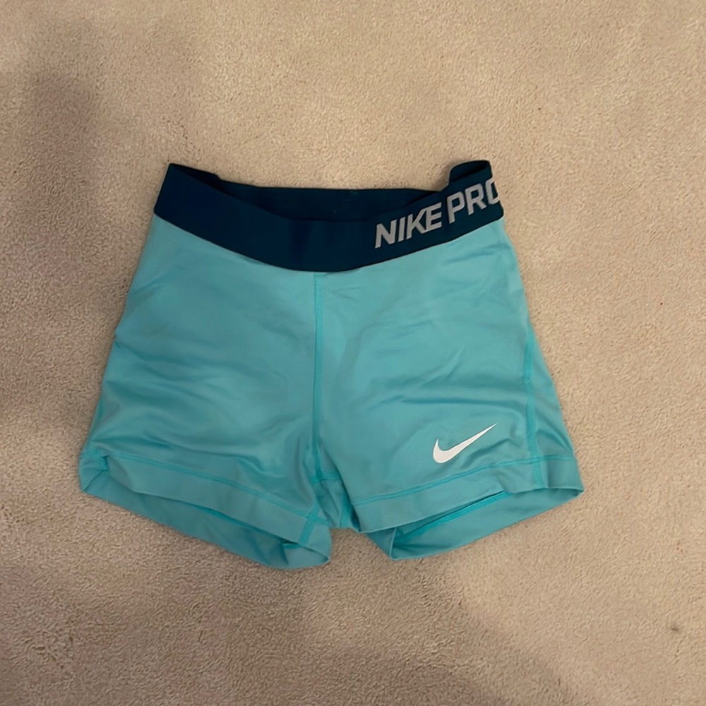 green nike pros